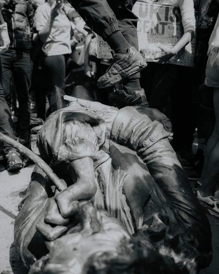 Peoplem  stood around Colston statue at Bristol BLM Protests